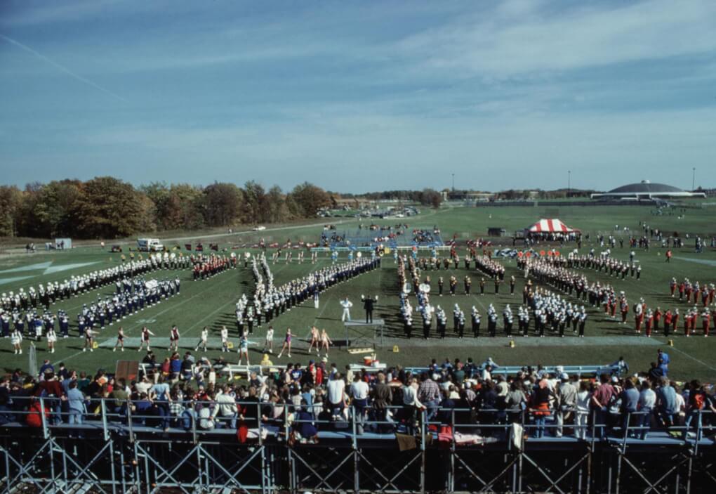 A 1978 photo of the football field, the band is forming the letters GVSC and the old Dome is in the background